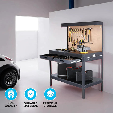 Heavy Duty Steel Workbench with Pegboard Drawers Light and Power Outlets 48 x 25 Inch Garage Workshop Table next to a car