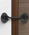 Heavy Duty Barn Door Latch And Lock Set Black Six Inch Hook And Eye Catch With Rust Proof Steel and included screws on wood panel.
