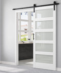 36X84 White Tempered Glass Sliding Barn Door With Complete Hardware Kit 6.6FT Rail Handle And Floor Guide in modern home interior.
