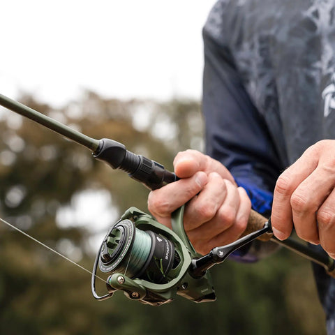 Spartacus II Spinning Fishing Rod And Reel Combo, 7 Foot Medium Heavy Action in use, featuring 3000 Size Reel and KastFlex IM6 Graphite Blank.