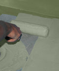 Hassle Free Liquid Waterproofing And Crack Isolation Membrane Straight Up Heavy Duty Anti Fracture Coating For Showers Fast Dry One Gallon Pail being applied with a roller.