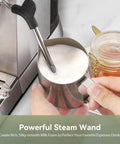 Barista Grade Espresso Machine With Milk Frother For Home Use steaming milk in a stainless steel jug