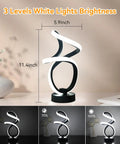 Modern Spiral Table Lamp With RGB And Dimmable LED White Light on desk showing 3 brightness levels, Pop Aesthetic Black Frost Finish