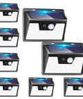 Eight Pack Solar Outdoor Lights With Motion Sensor, 3 Lighting Modes, Waterproof Exterior Lights For Walls Gardens Fences Decks And Yards, Solar Powered And Energy Efficient, No Wiring Easy Install in a black rectangular design