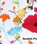 Close-up of Round Fitted Tablecloth with Elastic Edge No Slip Snug Fit Waterproof Oil Proof Vinyl Backed with floral design.
