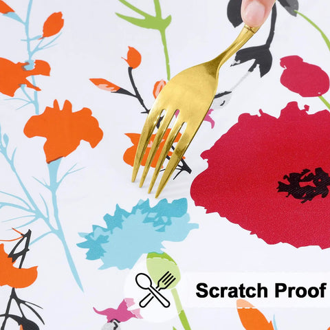 Close-up of Round Fitted Tablecloth with Elastic Edge No Slip Snug Fit Waterproof Oil Proof Vinyl Backed with floral design.