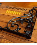Certified Knockout Vintage Cast Iron Shelf Brackets For Heavy Duty Wood Floating Shelves and Ornate Wall Mounted Display Supports laying on wood.