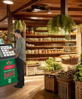 32 Inch Interactive Touchscreen Kiosk Featuring Full HD LCD Panel And Built In 5MP Camera With Slick Ten Point Capacitive Touch For Retail And Corporate Self Service That Really Nails It in grocery store setting.