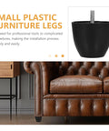 Four Pack Replacement Furniture Feet For Chairs And Sofas, black plastic and zinc alloy, easy install, shown near a brown leather sofa.
