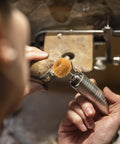 Using Buffing Wheel Set 1 Inch For Rotary Tool, 1/8 Inch Shank (3mm), Yellow 80 Grit Abrasive Buffing Wheels on wood object