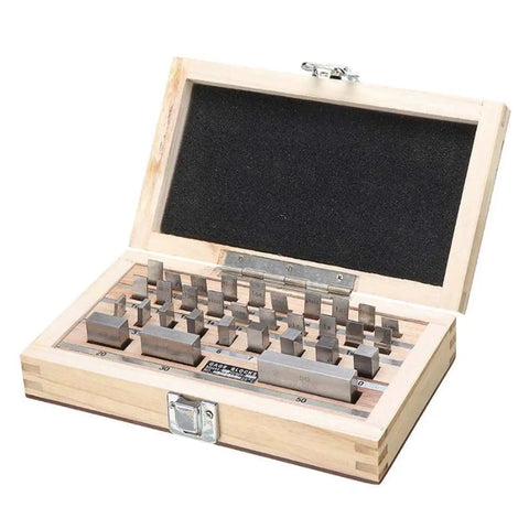 Dead Accurate Pro Grade Metric Gauge Block Set With Straight Shooting Steel Rulers And Router Table Setup Bars For Knockout Woodworking Precision Including Heavy Duty Storage Case 32 Pcs, open wooden case with steel gauge blocks.