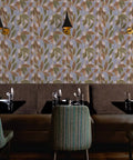 Top Shelf Hand Drawn Botanical Vinyl Wallpaper Featuring Subtle Leather Texture in a restaurant setting with green leaves.