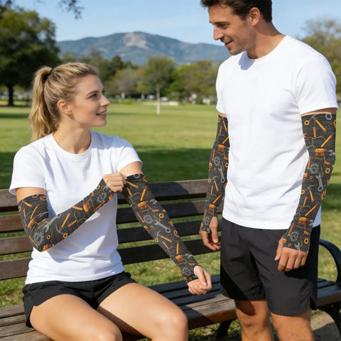 Cooling Arm Sleeves With Upf Fifty Plus Uv Blocking And Breathable Moisture Wicking Material For Running Cycling And Yard Work Flexible Compression Guards That Keep You Fresh On The Daily Grind worn by two people in a park.
