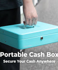 Person carrying Heavy Duty Locking Cash Box With Key Lock And Built In Money Tray Portable Metal Cash Safe, Cyan