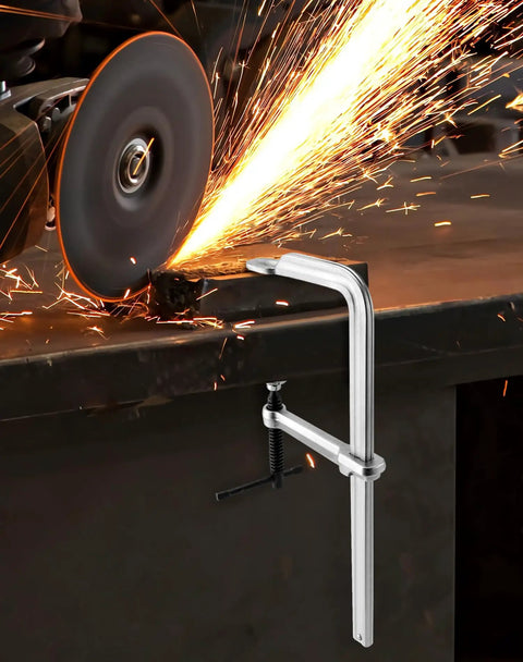 Heavy Duty 8 Inch F Clamp Four Pack With Drop Forged Bar Jaws Two And A Quarter Inch Throat Depth Corrosion Resistant Nickel Chrome Finish Rail Spindle And Handle Built For Pros on metal bench