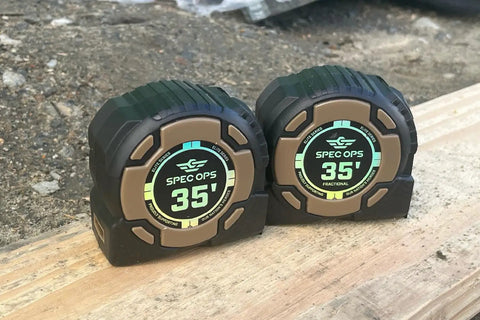 Kickin Tough 35 Foot Tape Measure Featuring Double Sided Blades And Grippy Magnetic Hook Military Hardened Composite Shell, two units side by side.