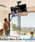 Heavy Duty 360 Degree Turntable Base For Ceiling TV Mounts showing smooth swivel in living room setup with viewer adjusting TV.