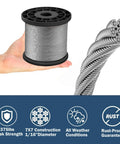 Heavy Duty Wire Rope Crimping Tool Kit With 100 Ft One Sixteenth Inch Stainless Steel Cable spool held by hand, close-up of cable strands