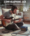 Man playing electric guitar indoors using Dope 10W Mini Portable Guitar Amplifier With Clean And Drive Tones, Type-C Rechargeable Battery.
