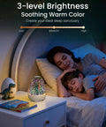 Night Light Bluetooth Speaker With 3D Glass Fireworks Lamp on bedside, family sleeping nearby, warm colors, perfect bedroom ambiance.