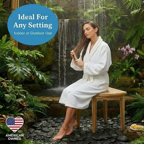 Woman seated on SnazzyCorner Waterproof Teak Shower Bench in garden setting