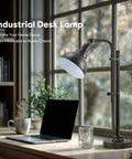 Rustic Bronze Adjustable Desk Lamp With Industrial Metal Task Lighting, 25 To 29 Inch Reach in a home office setting