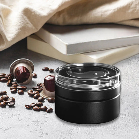 Smooth Operator 58mm Coffee Distributor And Leveler For Tight Espresso Pucks Top Shelf Tool For Home Baristas on a kitchen counter.
