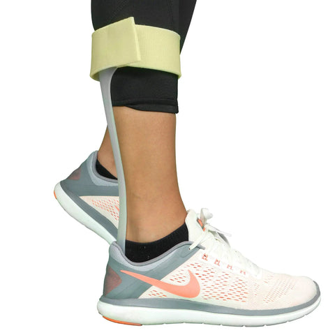 Left Ankle Foot Orthosis AFO Drop Foot Support Splint For Mild To Moderate Foot Drop worn with athletic shoe.