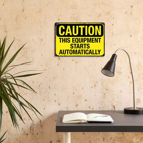 Warning Sign This Gear Starts Automatically Vintage Aluminum 8x12 Inch in indoor setting with desk and lamp
