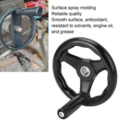 Image of Beefy Heavy Duty Lathe Hand Wheel 160mm Diameter with 16mm Mounting Hole displayed against workshop equipment.