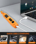 Hella Precise Mini Cordless Rotary Tool Kit With 105 Pieces Variable Speed Micro Drill Grinder connected to a laptop for USB-C charging.