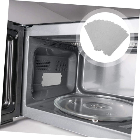 Open microwave showing installed mica sheet and 10 Piece Microwave Mica Sheets Set For Replacement Mica Plates Heat Resistant Insulation.