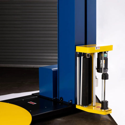 Heavy Duty Semi Auto Pallet Wrapper With Built In Digital Scale showing yellow and blue machine side and roller system