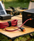 Top Shelf XT60i Extension Cable Male To Female 12 Awg 16 Foot Power Wire with reinforced connectors plugged into portable power station.