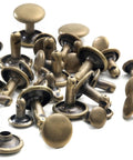 Heavy Hitter Copper Double Cap Leather Rivets Kit With Mixed Sizes And No Sweat Press Tool For Patching Denim Jackets Work Boots Canvas Totes Custom Gear Bronze, assorted bronze rivets laid out.