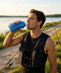 Man wearing High Visibility Reflective Running Vest Hydration Backpack Plus 500ml Soft Flask Hands Free All Day Lightweight Gear