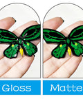 Comparison of butterfly painted with Air Dry Clay Varnish Sealant For Air Dry Clay Waterproof And Scratch Resistant Gloss Glaze That Prevents Cracks And Wear Dries Clear With A High Gloss Finish For A Sharp Pro Grade Durable Studio Quality Look in gloss and matte finishes.