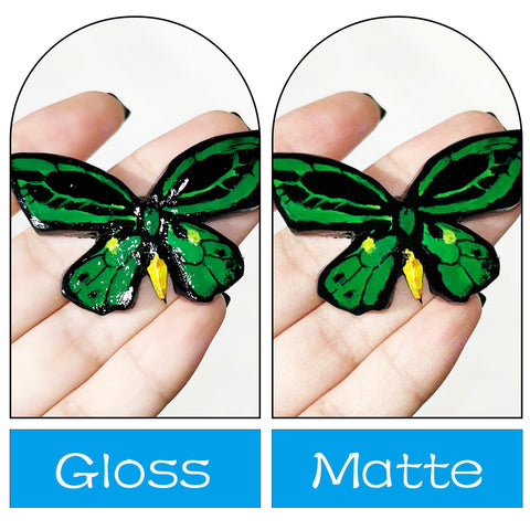 Comparison of butterfly painted with Air Dry Clay Varnish Sealant For Air Dry Clay Waterproof And Scratch Resistant Gloss Glaze That Prevents Cracks And Wear Dries Clear With A High Gloss Finish For A Sharp Pro Grade Durable Studio Quality Look in gloss and matte finishes.