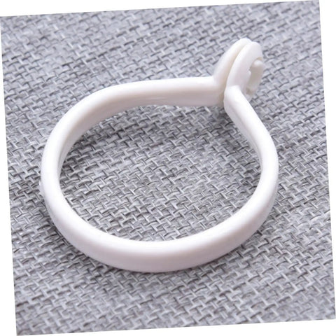 Single white ring from 60 Pack Plastic Curtain Rings For Rods Thick Durable Construction With Smooth Glide For Heavy Curtains Easy Install