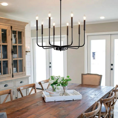 Eight Light Black Industrial Candle Chandelier For Dining Room And Kitchen Island over wood dining table