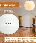 Jumbo 30 Inch White Paper Lanterns Hanging Luminaries For Weddings And Events showcased in a modern room setting.