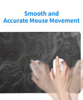 Hand using mouse on Extended Large Gaming Mouse Pad Desk Mat 27.6x11.8 Inches With 3mm Non Slip Base And Stitched Edge