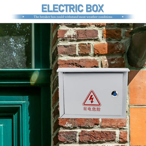 Outdoor mounted weatherproof metal electrical junction box on brick wall for control panels, 300x400x160mm enclosure with warning symbol.