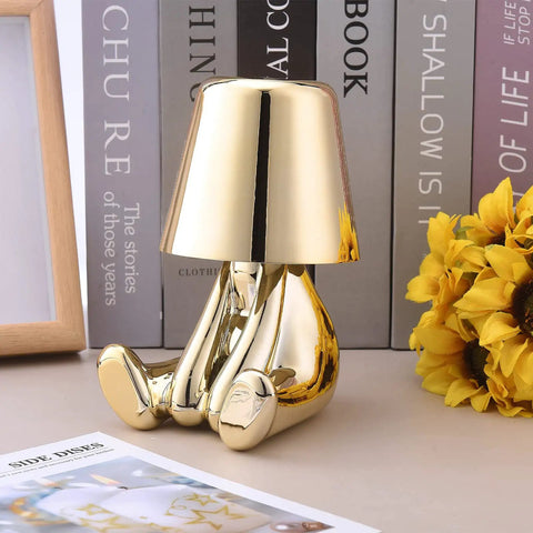 Gold Decor Thinker Statue Bedside Table Lamp With USB Port, Touch Control LED Night Light, on a bedroom table