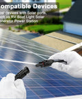 Hands connecting Solar Panel Extension Cable 6 Ft Black And Red, 10 AWG 6mm2 Wire With Male And Female Connectors on rooftop