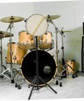 Slick Folding Snare Drum Stand With Adjustable Height Tripod Design Hella Stable Alloy Build; showcasing a snare on a stand in a drum setup.
