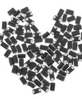 Heavy Duty US1K 1A 800V Rectifier Diodes 100 Pack arranged in a heart shape, showing SMD design and size, ideal for electronics.