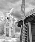 3 In 1 Metal Construction Kit With 273 Parts Tower Crane Frame Crane Windmill Model Set showing windmill model in front of real windmill