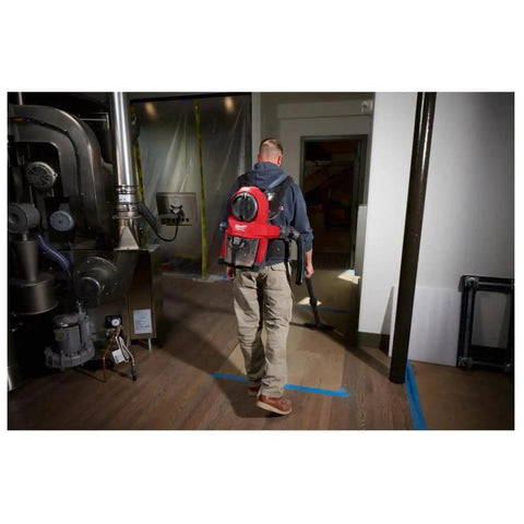 Worker using M18 FUEL 3-In-1 Backpack Vacuum For Jobsite Cleanups With Powerstate Brushless Motor, Cyclonic Filtration