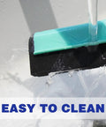 Light Duty Floor Squeegee With 43 Inch Adjustable Aluminum Handle being rinsed under water for easy cleanups